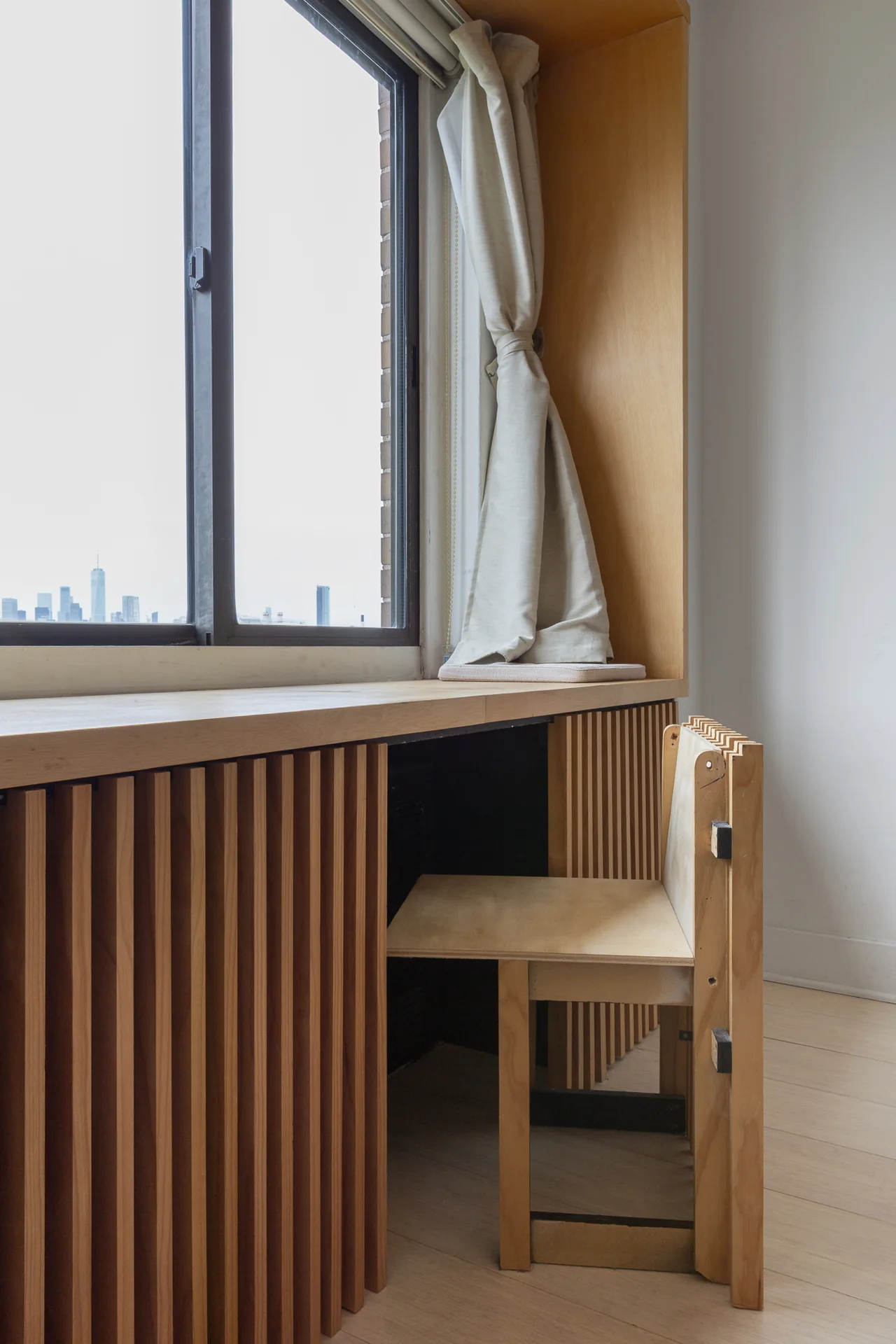 Built-in timber window seat and radiator cover
