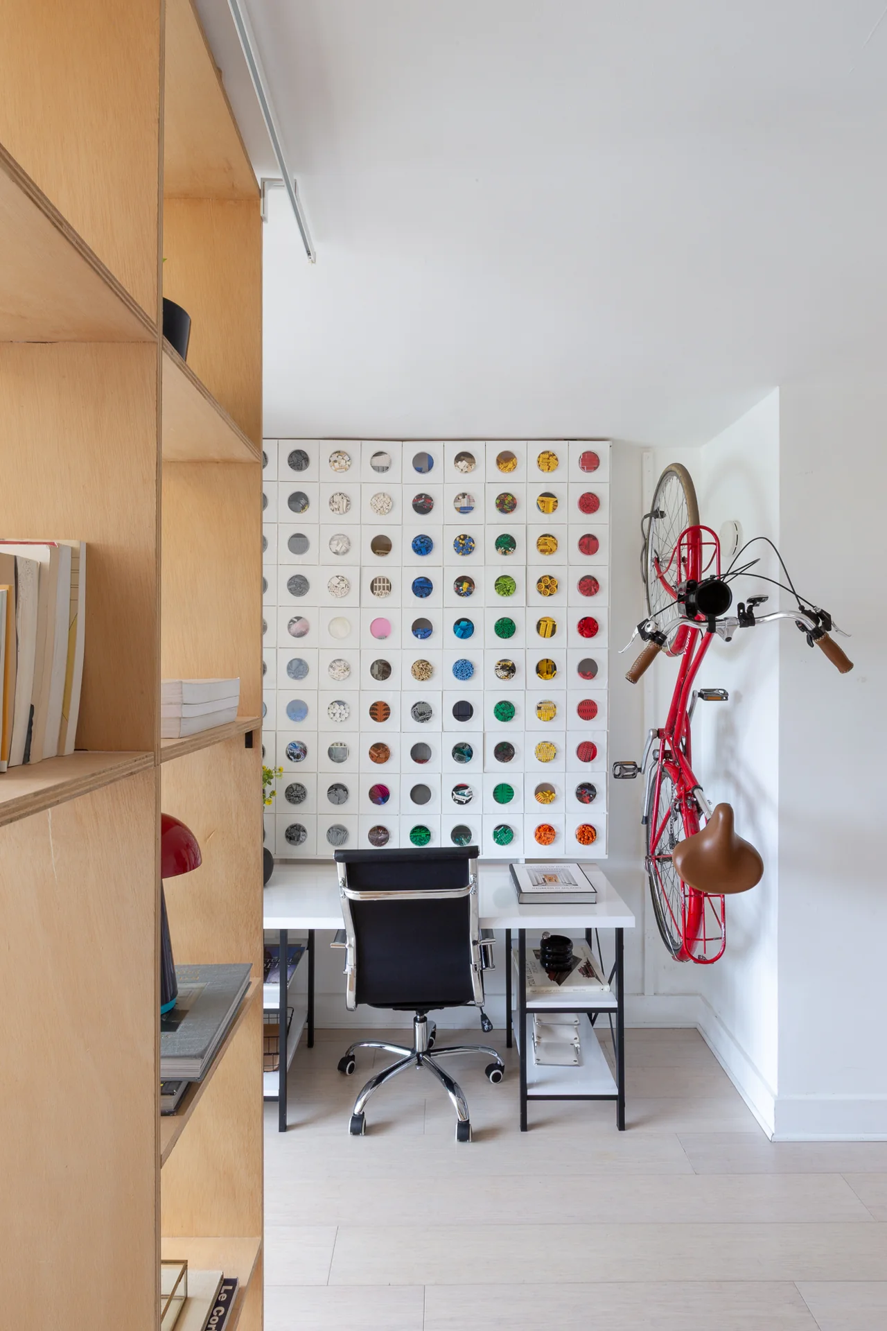 Timber joinery dividing the sleeping area and workspace